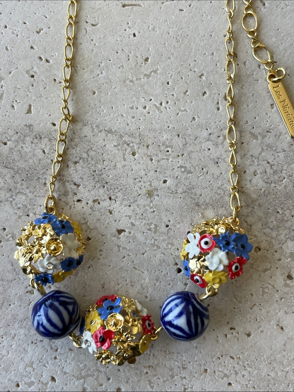 Gold Floral Bead Necklace with Blue, Red & White Accents